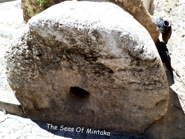 Millstone With Baby Shoes